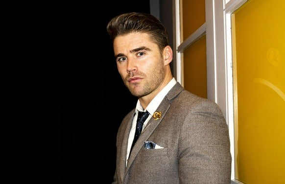 Luxury men's accessories including ties, lapel pins, tie clips and pocket squares