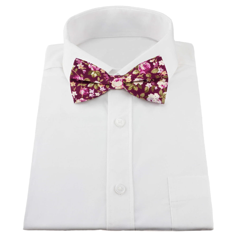 White shirt with a floral bow tie on a white background