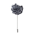 Floral-patterned lapel pin on a white background