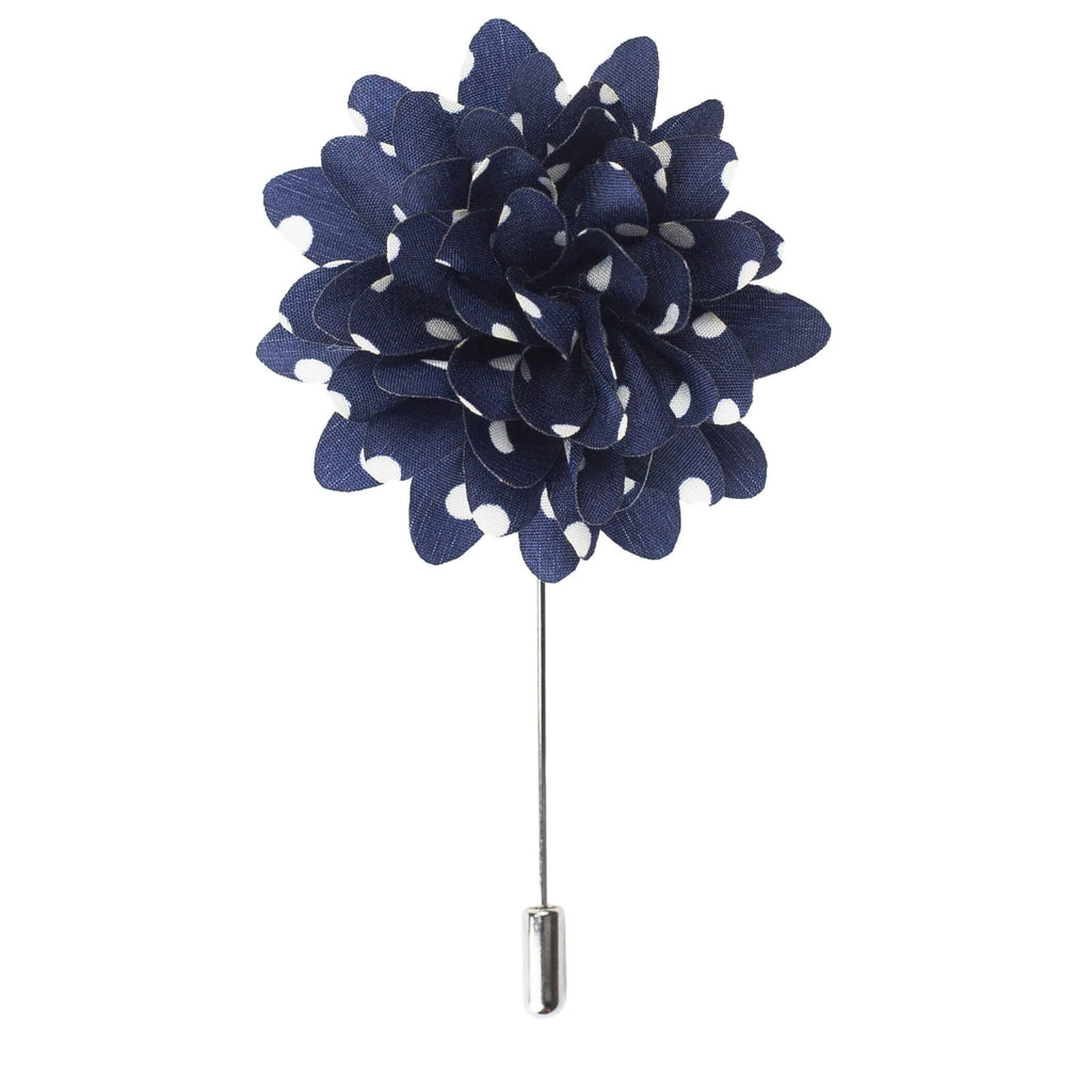Navy blue flower lapel pin on a white background