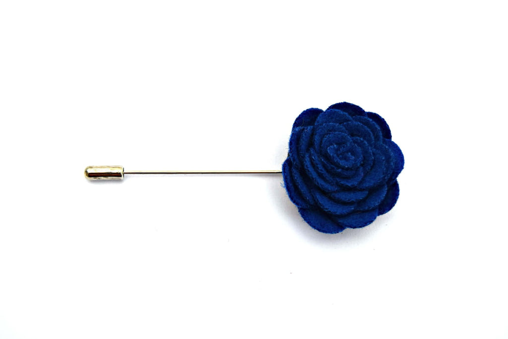 Blue rose-shaped lapel pin on a white background