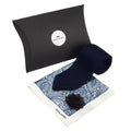 Navy knit tie and patterned pocket square with 'MILAPEL' branding on a white background