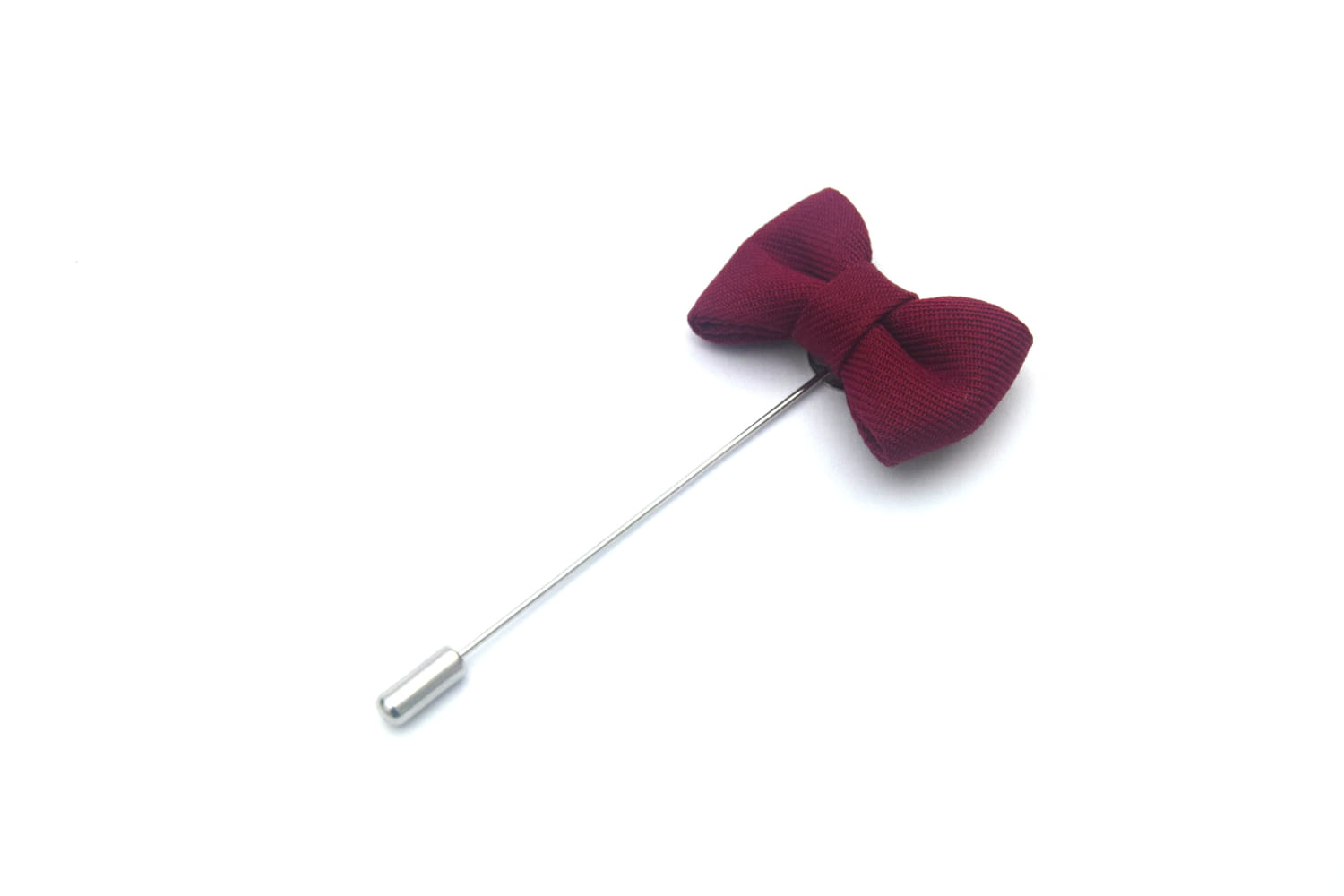 Maroon bow tie pin on a white background