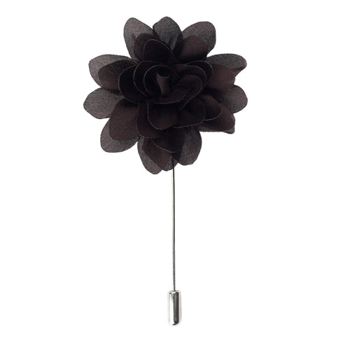 Black flower lapel pin on a white background