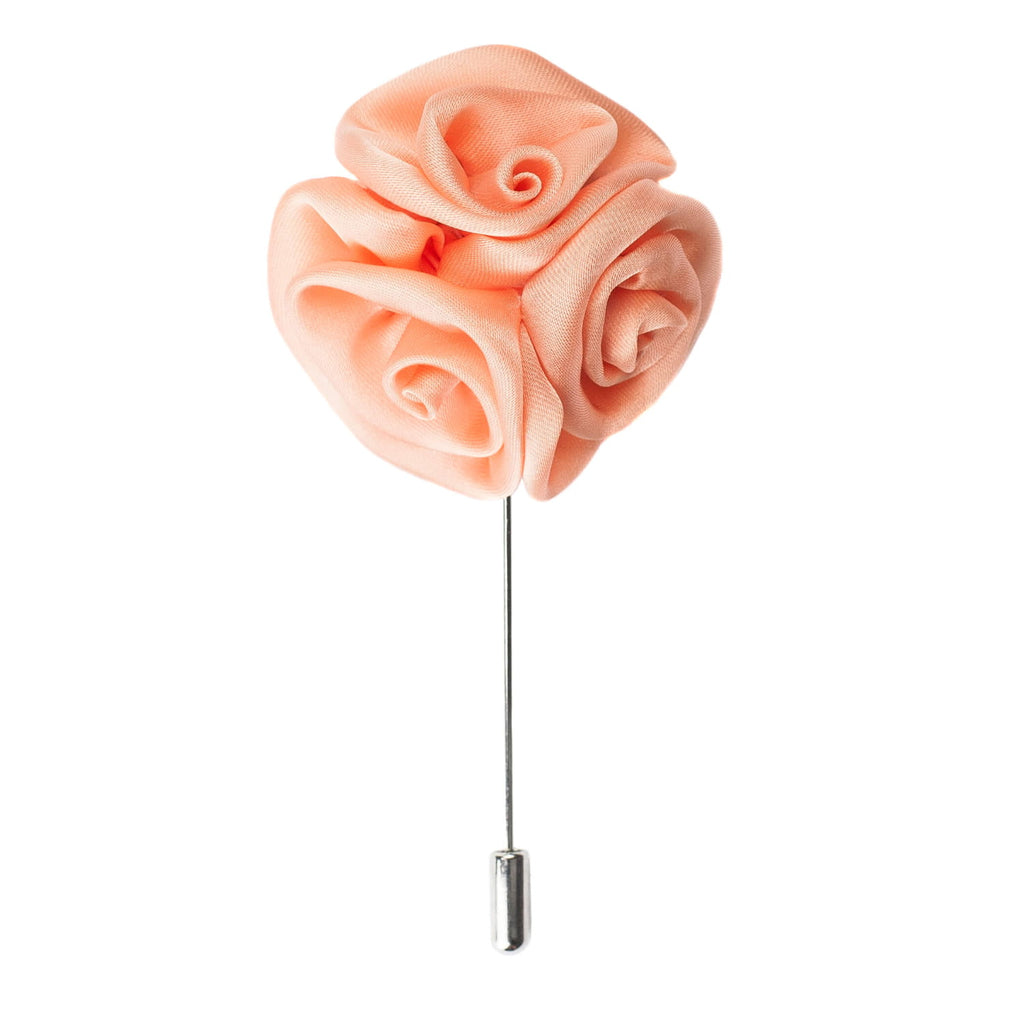 Pink rose flower lapel pin on a white background