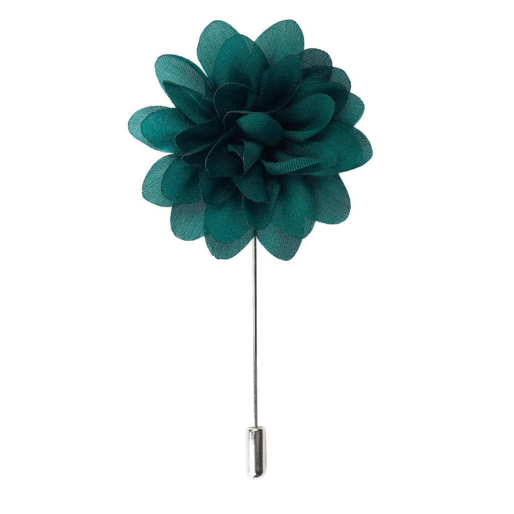 Teal flower lapel pin on a white background
