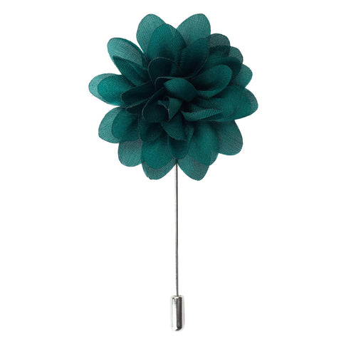 Teal flower lapel pin on a white background