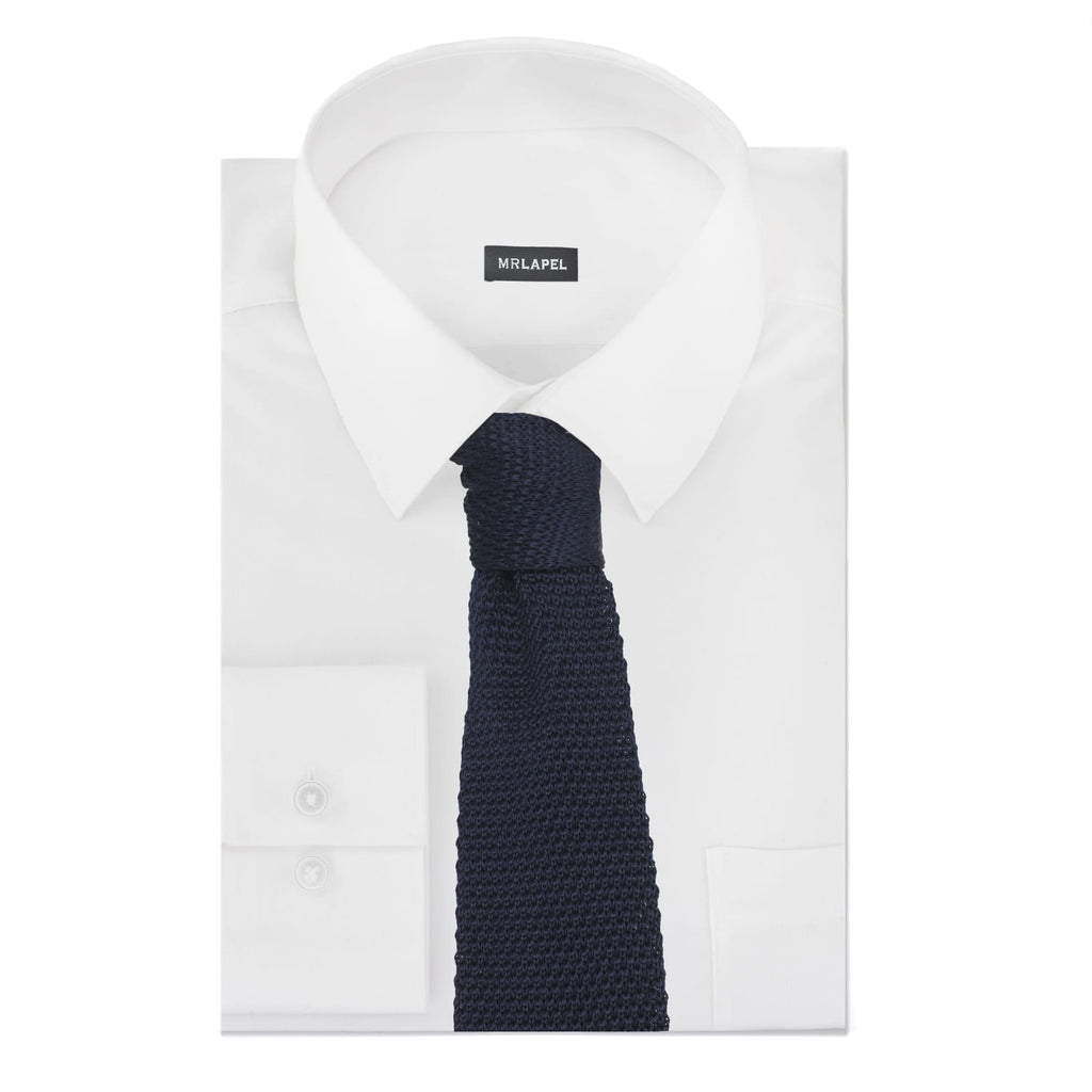 navy knitted silk tie on white shirt