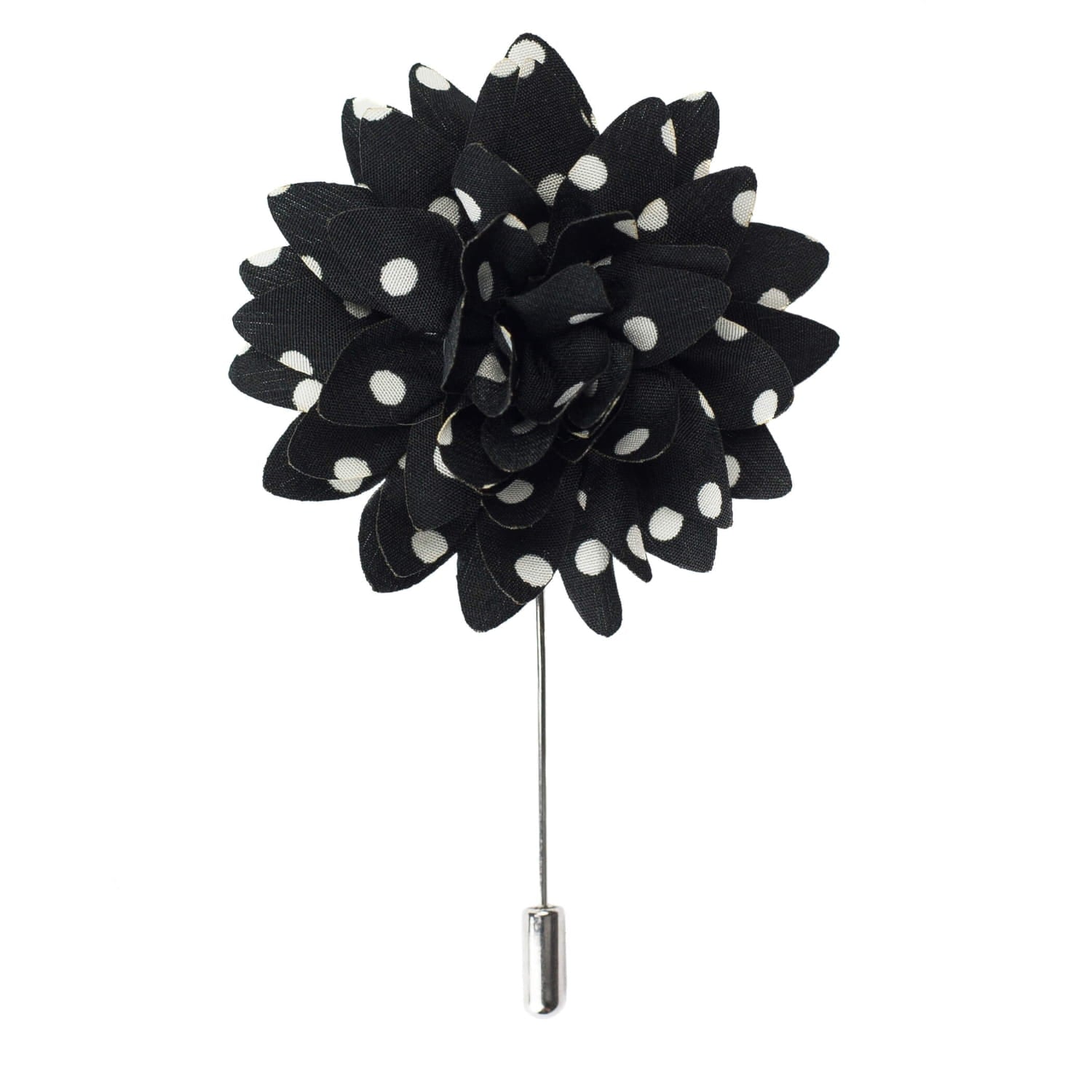 Black flower-shaped brooch with white polka dots on a white background