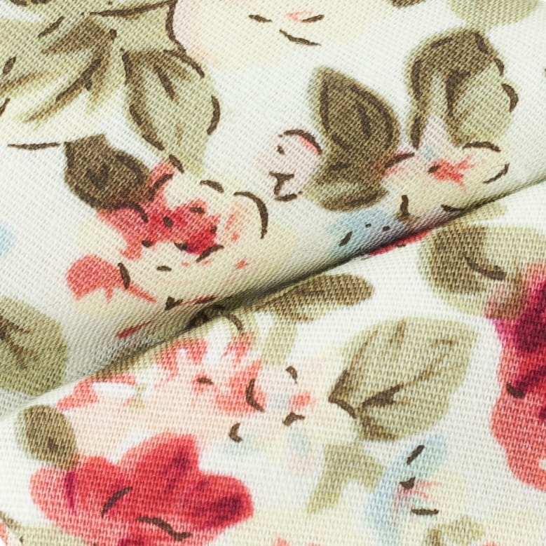 close up of bow tie pattern, cream fabric with pink flowers and green leaves