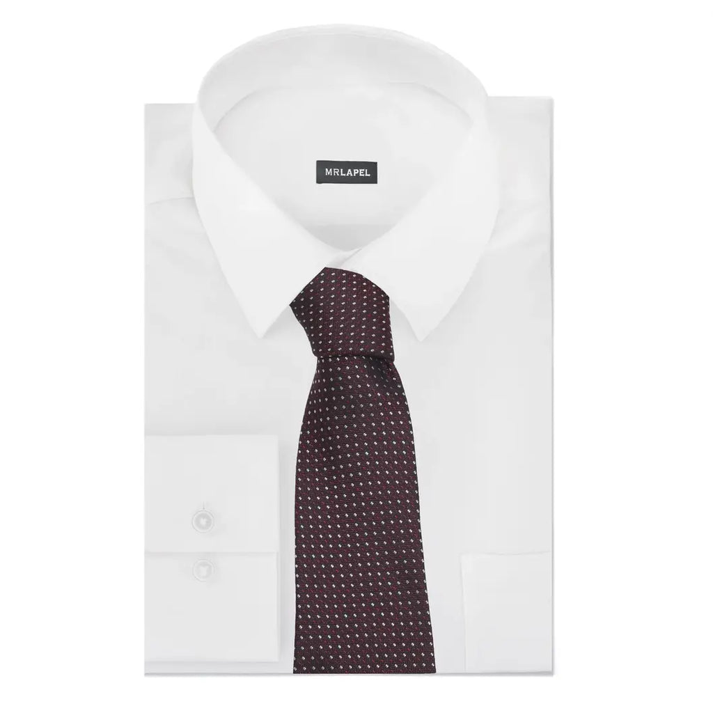 White dress shirt with a patterned tie on a white background