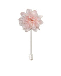 Pink flower lapel pin on a white background