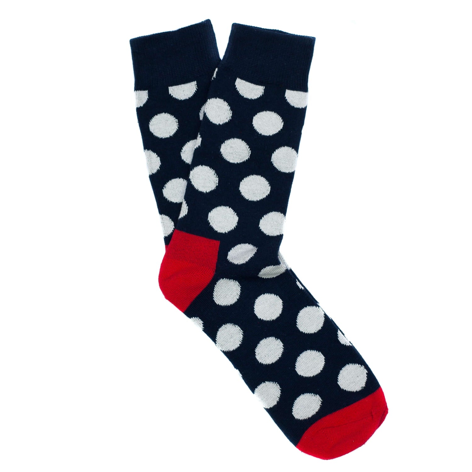 Navy sock with white polka dots and red heel and toe on a white background