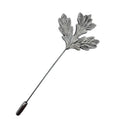 Silver leaf-shaped lapel pin on a white background