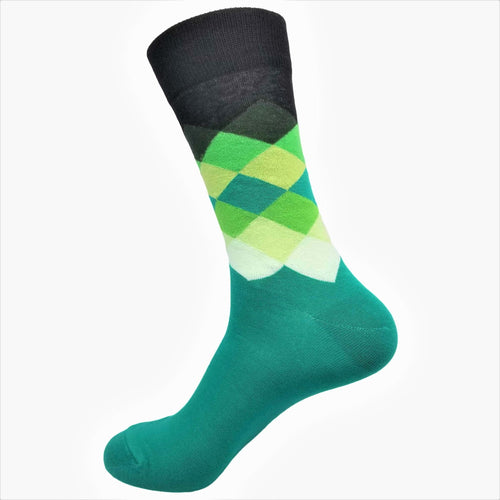 Green and black argyle patterned sock on a white background