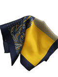 Navy and yellow patterned pocket square on a white background