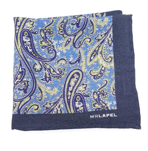Navy blue pocket square with a blue and yellow paisley pattern, branded 'MRLAPEL'.