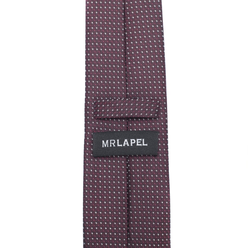Rear view of burgundy tie against a white background