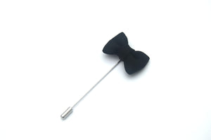 black lapel pin