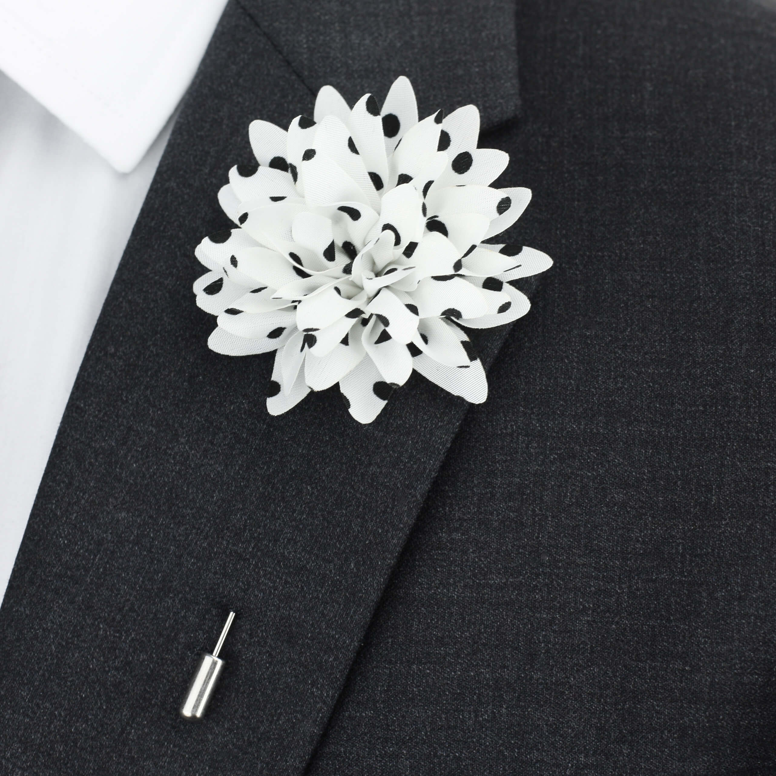 white and black polka dot lapel pin flower