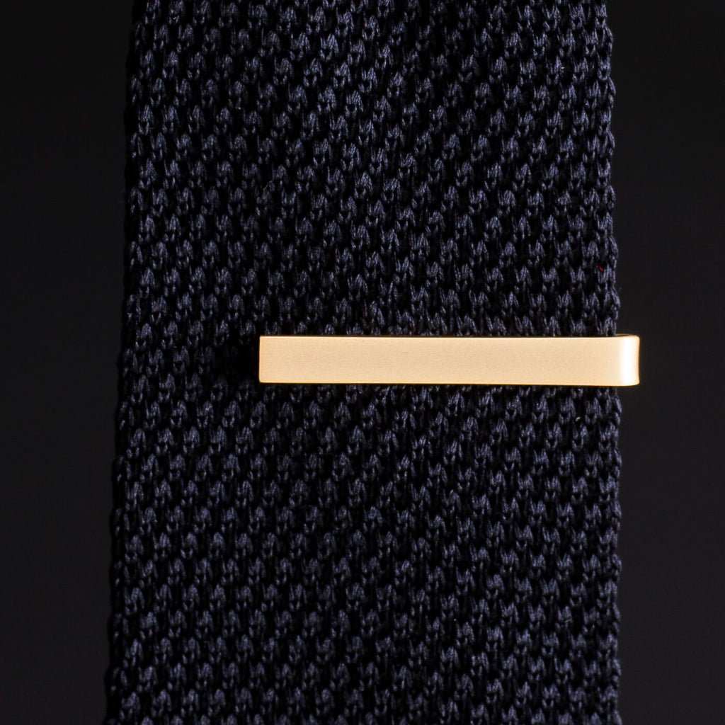 gold tie slide