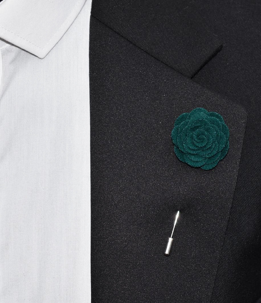 green button hole, green lapel pin flower
