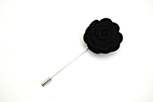 black lapel pin flower