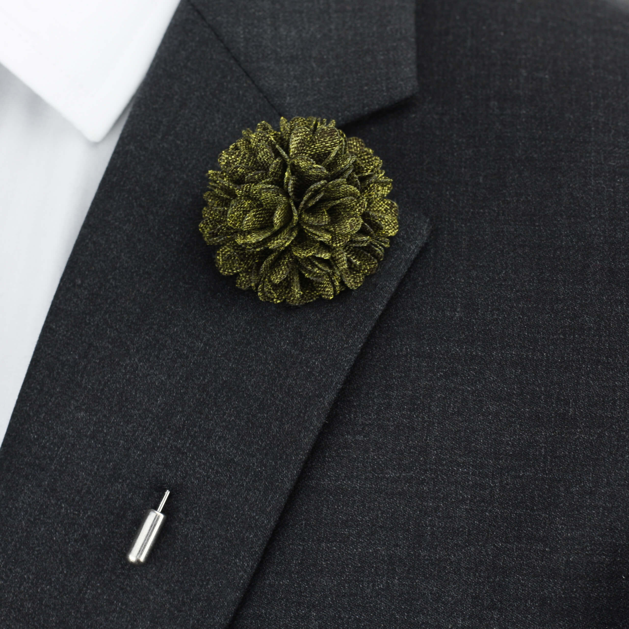 green button hole, green lapel pin flower