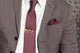 burgundy spotted tie with tie clip and burgundy pocket square